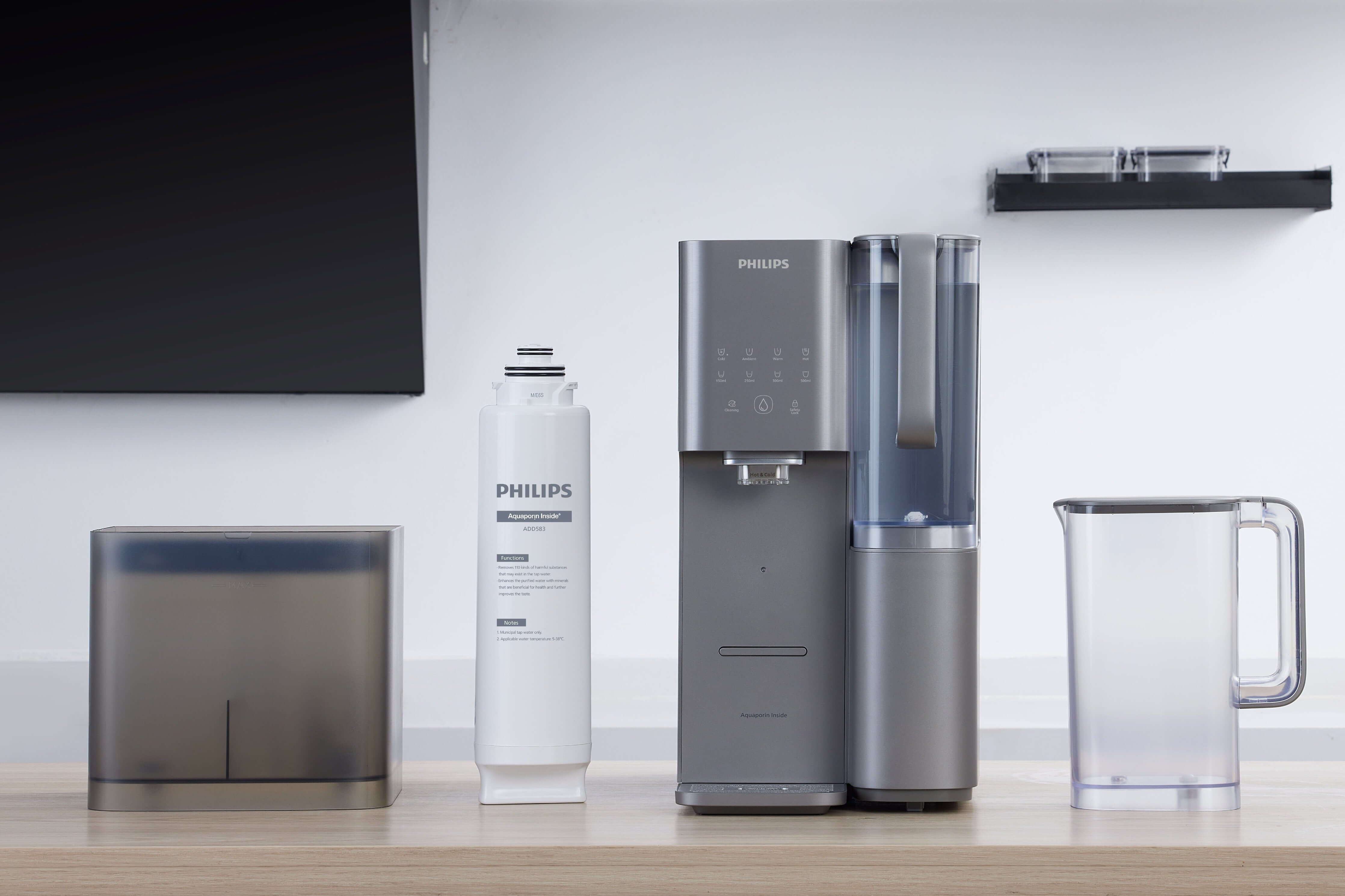 Philips Aquaporin Reverse Osmosis Water Station on a wooden countertop.