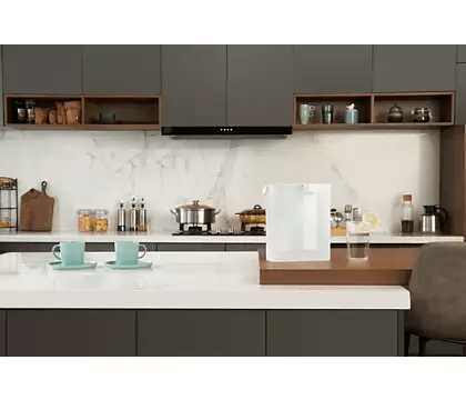 A white Philips Instant Water Filter displayed in the kitchen.