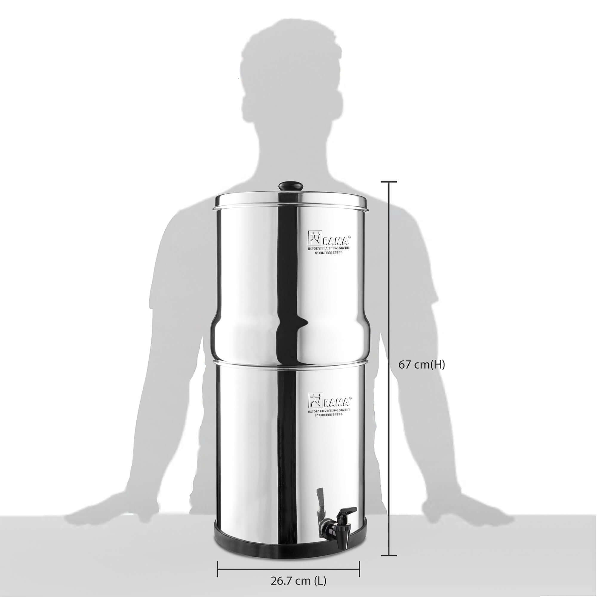 A RAMA stainless steel water purifier with a tap, measuring 67 cm in height and 26.7 cm in length, is shown against a human silhouette. This RAMA GRAVITY Water Filter comes with 2 RAMA Carbon Cartridges.