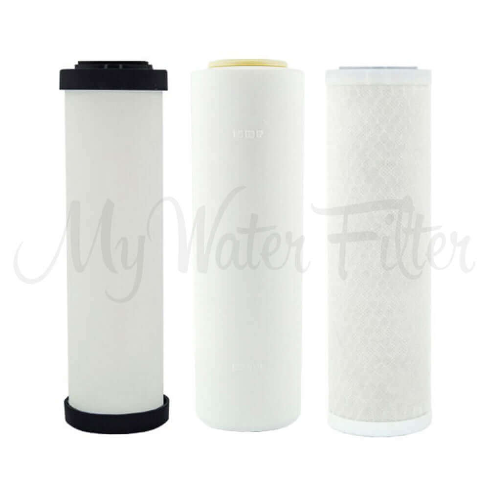 A trio of Doulton Replacement Cartridge Pack for Ultracarb 0.5 Micron, designed as white cylindrical water filter cartridges with varied textures and end caps, fits the 10" Triple Benchtop-Under Sink City Water Filter for fluoride removal and double carbon filtration.