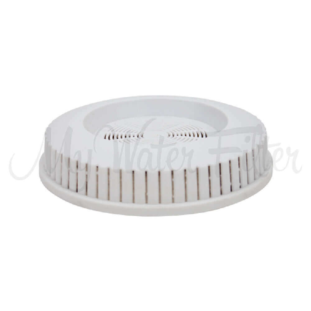 A mineral pad replacement in white circular with a vented design. Perfect for use in the 6 and 7 Stage Multi Use pH Elevation Benchtop Gravity Water Filter, it enhances pH level of the water.