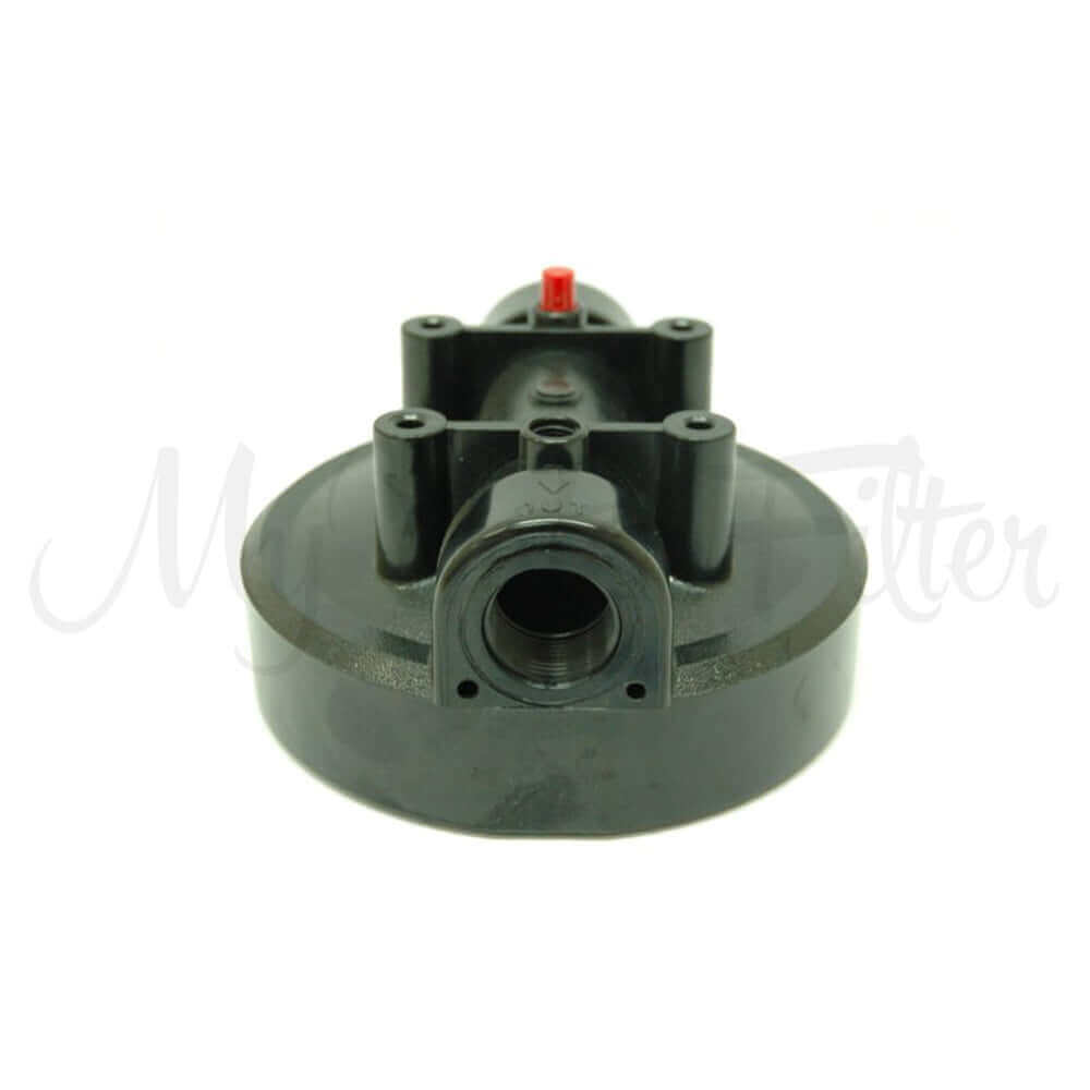 Close-up of a Big Blue Black Cap featuring a red button and two large cylindrical sections on top, with a 1" threaded inlet and outlet.