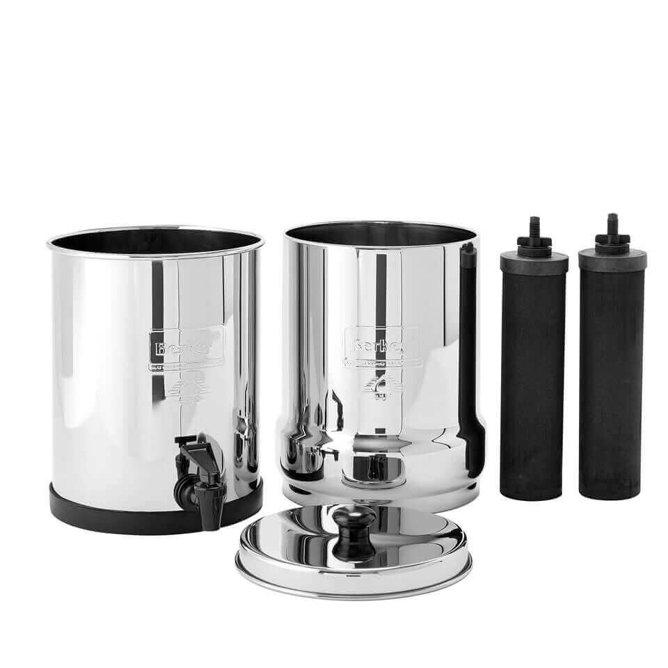 Travel Berkey System (1.5 gal) by Berkey: A shiny stainless steel water filter system with top and bottom chambers, a lid and two black filter cartridges.