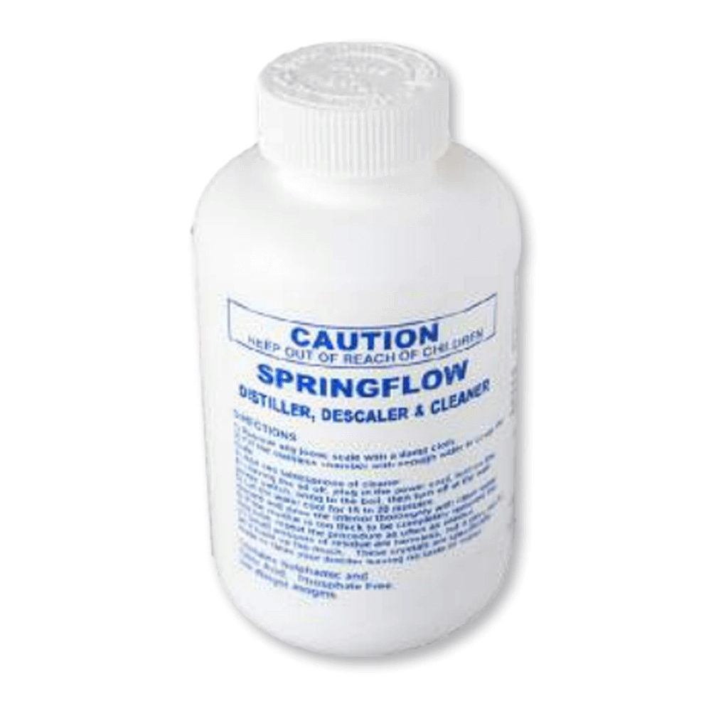 A white bottle labeled "Descaler And Cleaner to suit Spring Flow Steam Distiller" with caution instructions in blue text.
