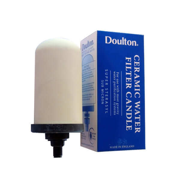 A white ceramic Doulton Super Sterasyl Ceramic Water Filter Candle beside its blue Doulton packaging box.