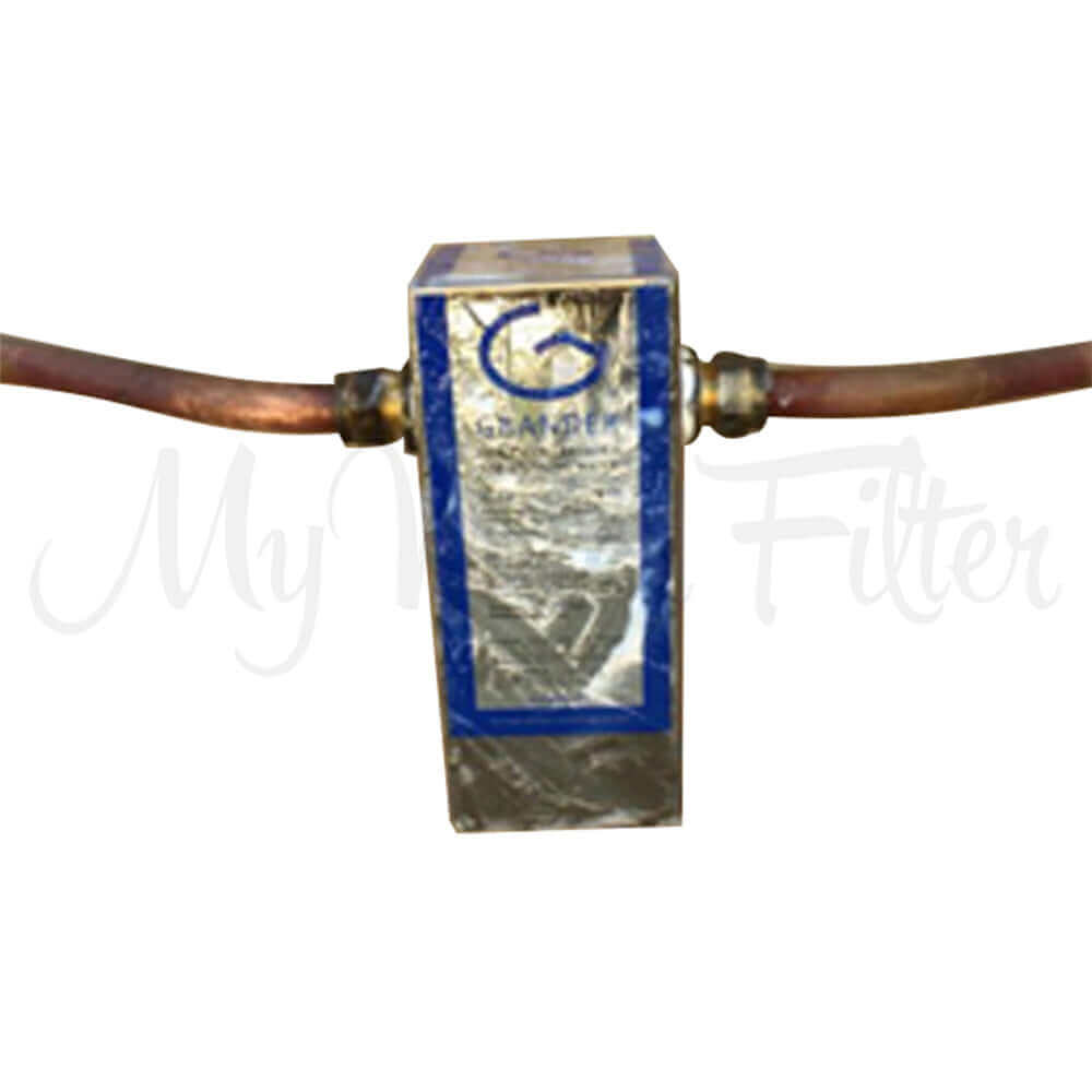 A Grander Whole House System features a Grander in blue and silver with copper pipes on either side