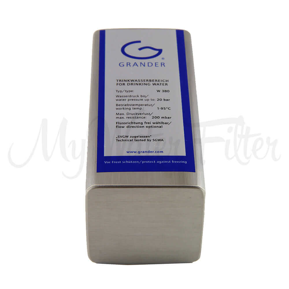 The Grander Whole House System is a rectangular metallic water revitalization device with printed specifications