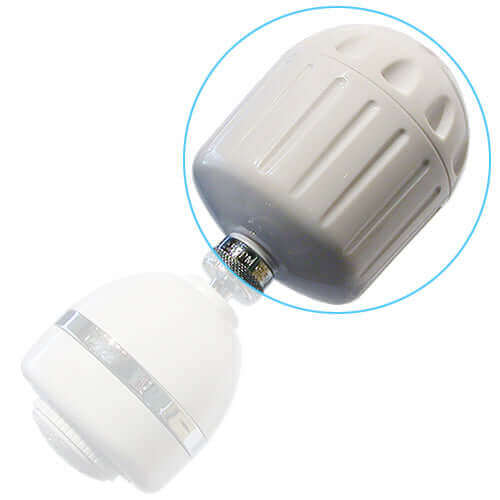 The Sprite High Output Shower Filter - White, featuring a sleek design and a screw-on attachment to a white shower head, ensures chlorine-free showers.