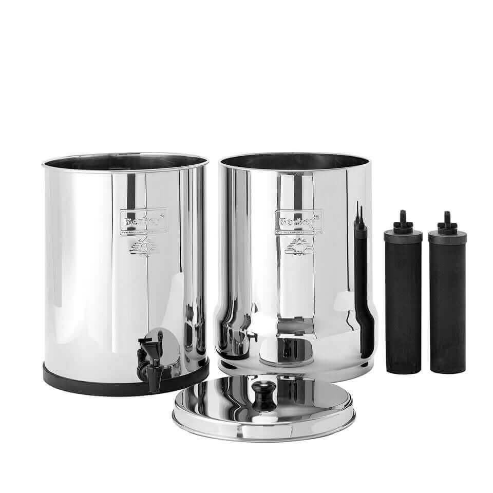 An Imperial Berkey System by Berkey featuring top and bottom tanks, a lid, and two carbon block filter elements on a white background.