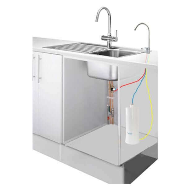 A transparent view of a kitchen sink setup reveals the plumbing and an UltraStream Hydrogen Rich Ioniser Water Filter System with Under Sink Kit beneath the countertop, offering hydrogen-rich water for your needs.