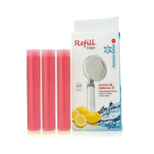 Three Rose-scent refill cartridges sit beside a box featuring images of an Aroma Sense Q shower head and lemons, offering an Aroma Sense Q Vitamin C-infused and chlorine-free shower experience.