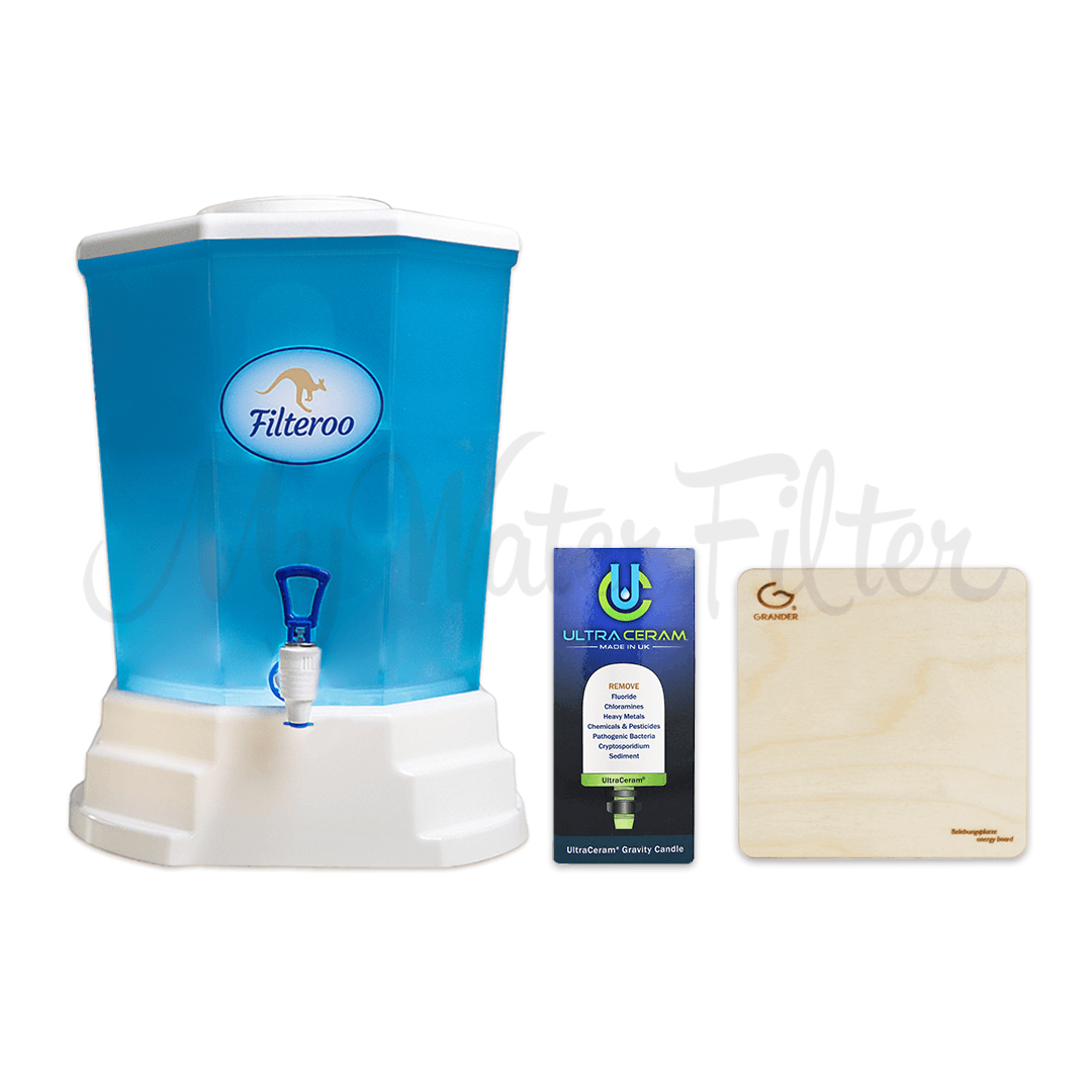 The Filteroo® Blue 20L Benchtop Gravity Water Filter with Ultraceram features a white base and comes with a cartridge box and a wooden Grander Board.