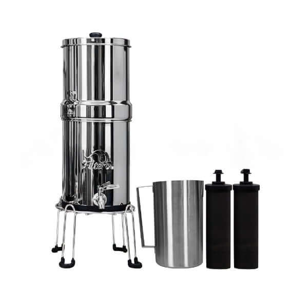 Filteroo® Stainless Steel Gravity Water Filter sits on a stand with two black carbon block filters and a stainless steel jug