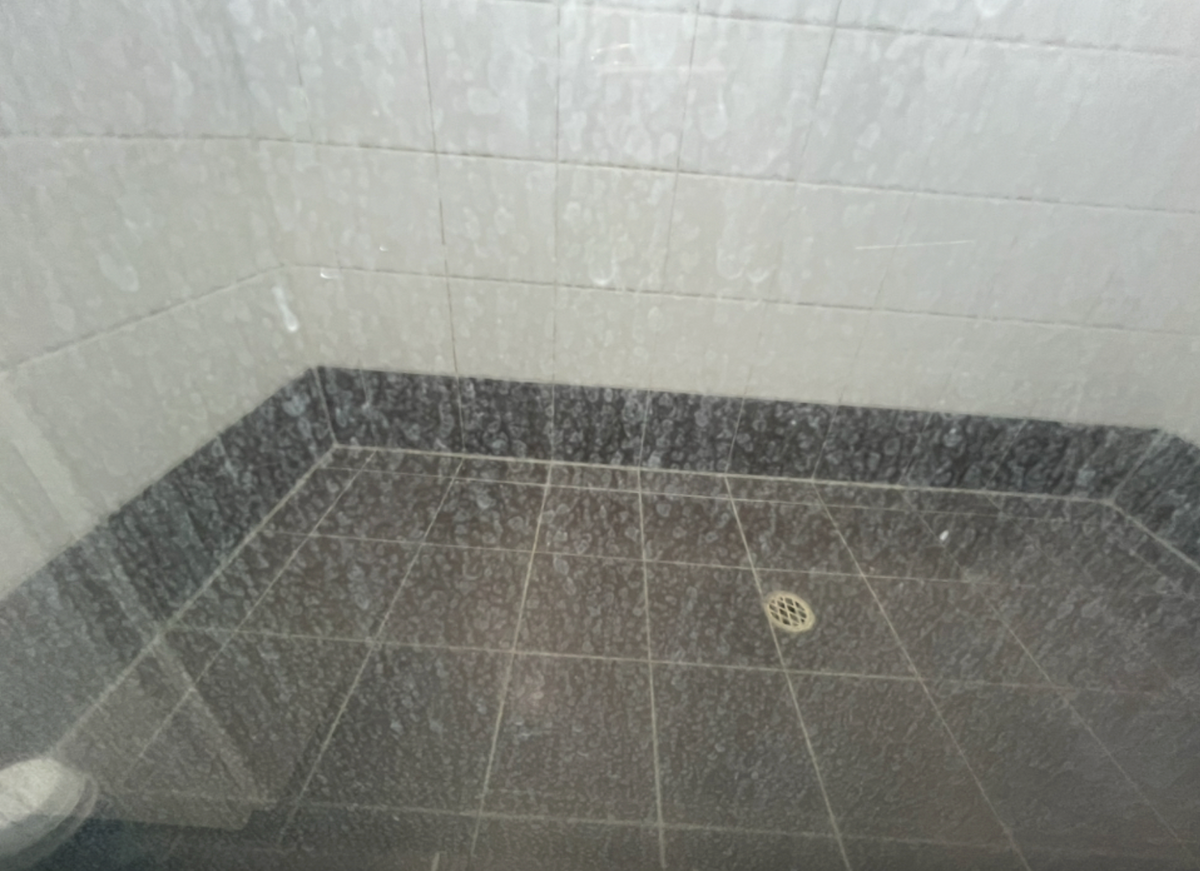 Hard water marks on shower glass