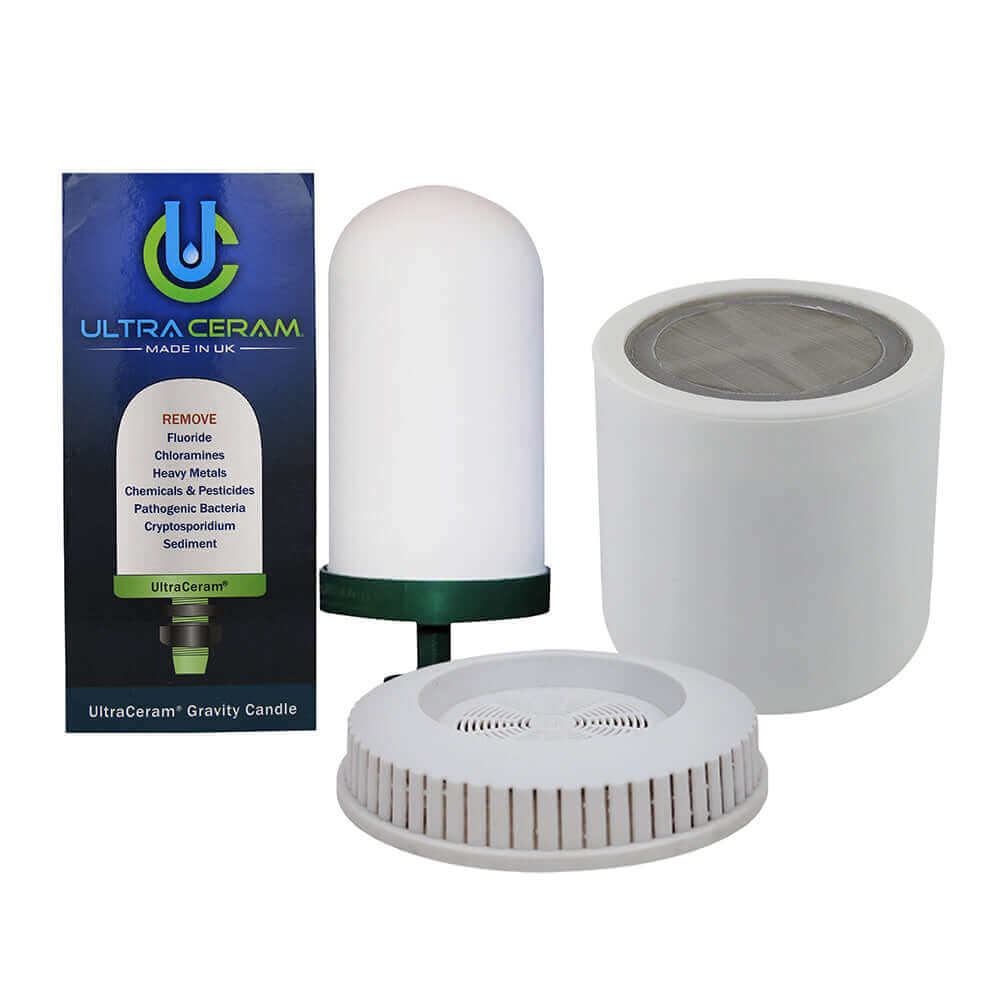 Ultraceram components and packaging, consisting of a filter candle, a disc shape mineral pad and a white shower filter cartridge.
