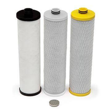 Three Aquasana AQ-5300+R replacement cartridges featuring different colours of end caps: Activated Carbon in black, Catalytic carbon in white, and yellow for Ion Exchange