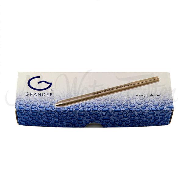 Blue and white box from Grander Penergizer with a Grander logo and a metallic pen on top.