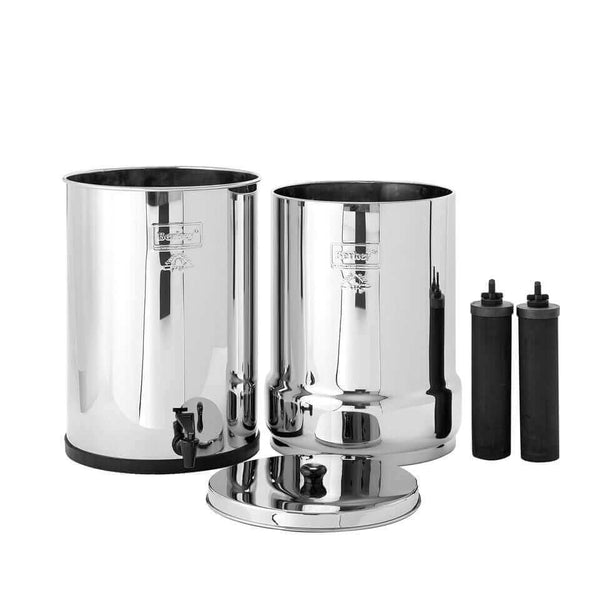 Top and bottom tanks of Crown Berkey System (6 gal) stainless steel water filtration unit by Berkey with black filter cartridges and a lid on a white background.