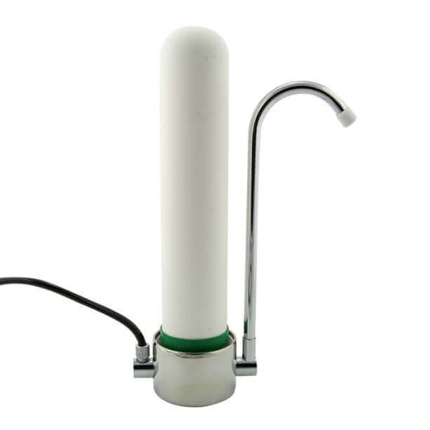 Ultraceram by Doulton features a slimline ceramic water filter candle with double O-ring, designed as a white cylinder for countertops and includes a curved metal faucet.